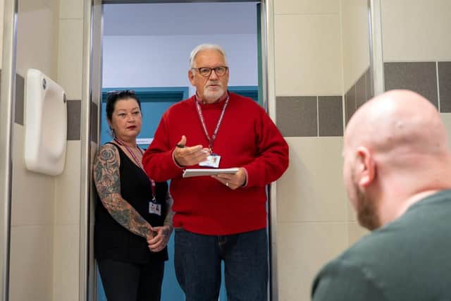 Two ICVs in the door of a custody cell