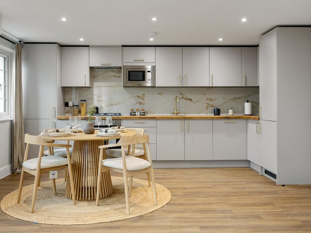 The kitchen and dining area of one of the new luxury apartments