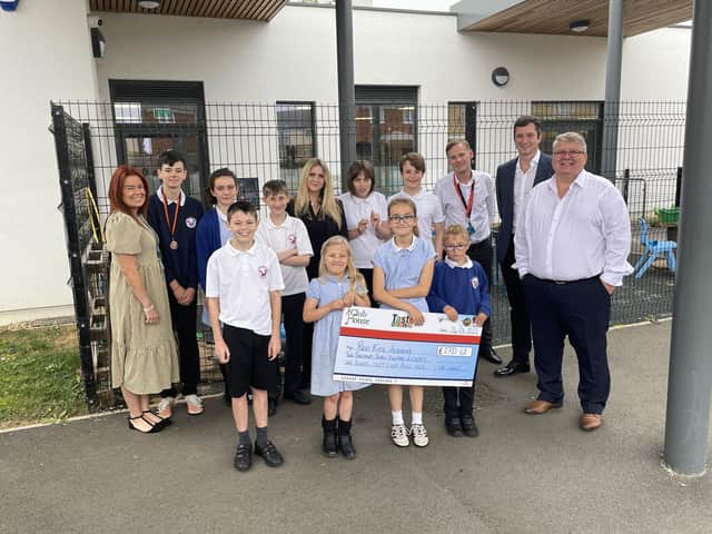 The cheque was handed over to Red Kite Academy