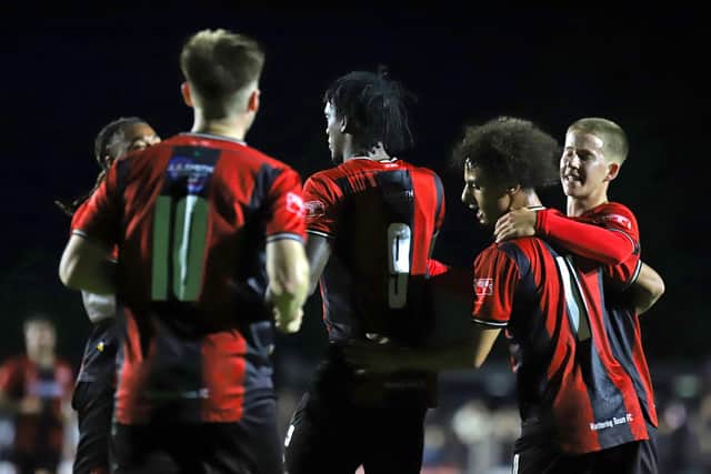 The Poppies players celebrate Nile Ranger's opening goal (Picture: Peter Short)