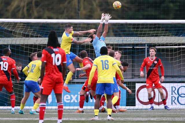 Arlo Doherty catches the ball under pressure against AFC Sudbury (Picture: Peter Short)