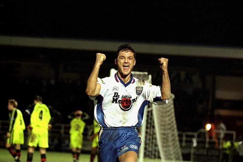 Ray Warburton of Rushden and Diamonds celebrates his extra time equaliser during the FA Cup Third Round replay against Sheffield United in 1999 at Nene Park. The game finished 1-1 after extra time but Sheffield United progressed after winning 6-5 on penalties.