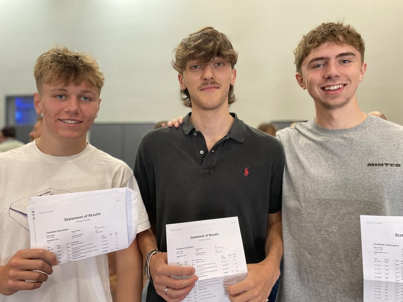Charlie Wilson (L), Callum Clipston and Rory Swan (R) collecting their results at Prince William School, Oundle
