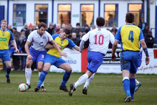 Action form a derby between AFC Rushden & Diamonds and Wellingborough in 2014