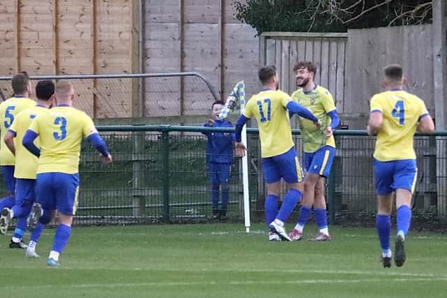 Will Jones celebrates netting Wellingborough Town's goal in their 1-1 draw with St Neots Town (Picture: Phil Passingham)