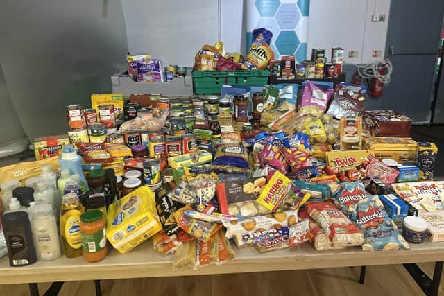 Donated items included toiletries, tinned food, and snacks