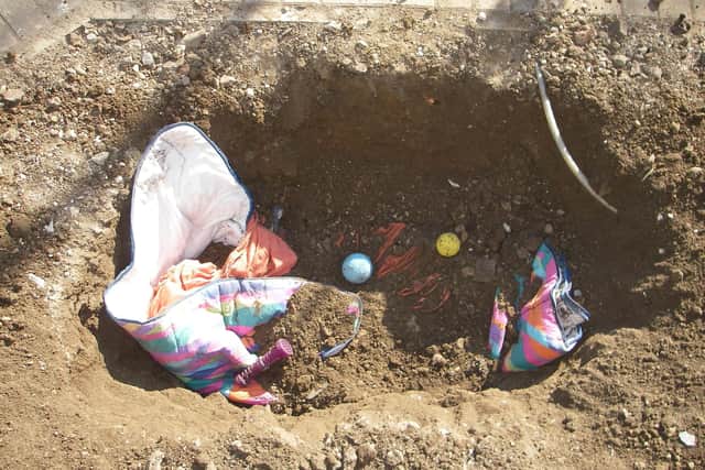 This hole was dug at the back of Baverstock's home.