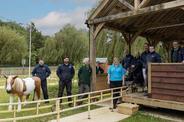 The team which worked on the Jolly Jockeys installation