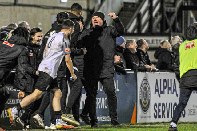 Corby Town boss Gary Setchell shows his delight after his team claimed a sixth win in a row with a 1-0 success over Spalding United at Steel Park. Picture by Jim Darrah