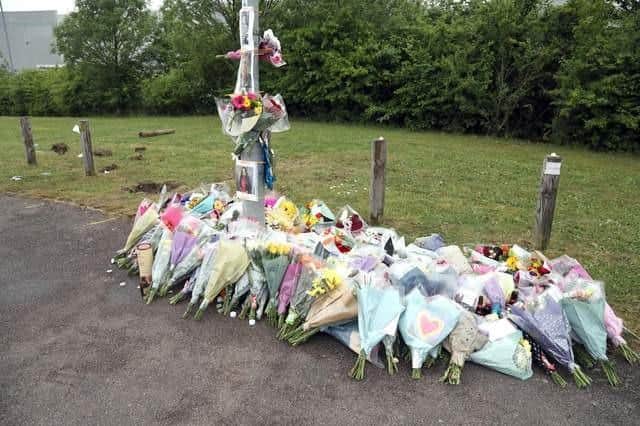 Floral tributes left at the scene.