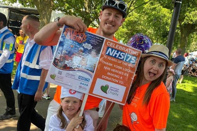 Christina Kelly works at Northamptonshire Health Charity, pictured with her family at the Carnival