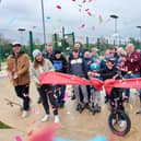 BMXer Millie Brooks alongside children from Gretton and villagers cut the ribbon at the new skatepark. Image: Peter Mason Photography