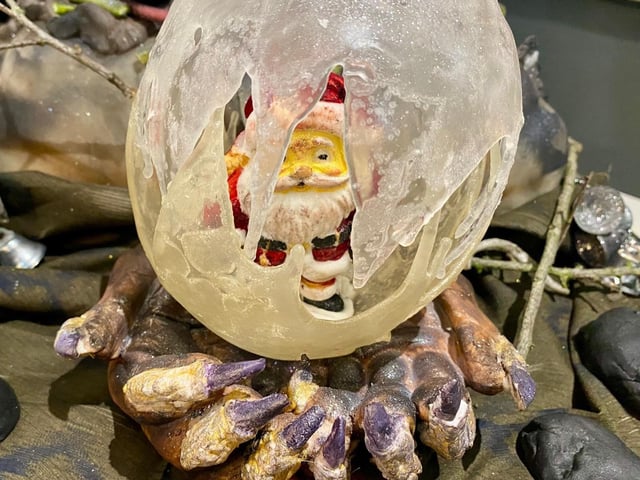 Krampus with his Santa Snow globe