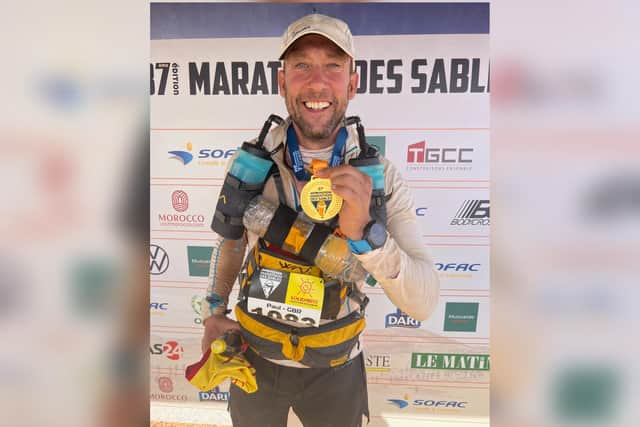 Paul Goodyear with his medal after completing the race
