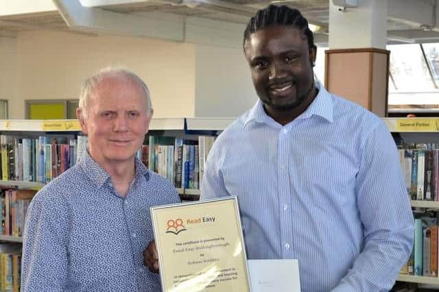 l-r Paul Hammond (coach) and Rohan Walters (reader). Rohan graduated from the Read Easy scheme in Wellingborough