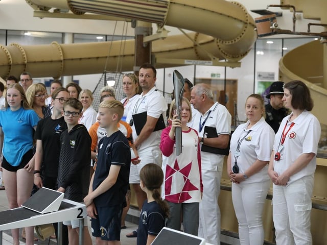 Rebecca Johnson parades the baton