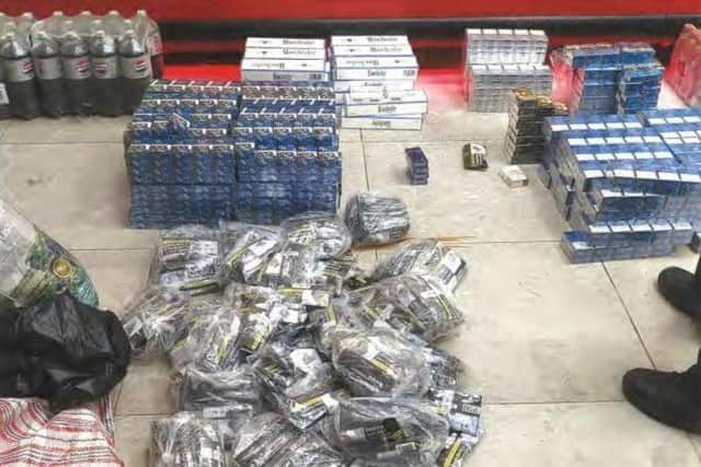 Northamptonshire Police said they found 2,519 packs and 624 pouches of illicit tobacco in the shop. Credit: Northamptonshire Police