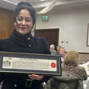 Dr Huda Taha with her Award