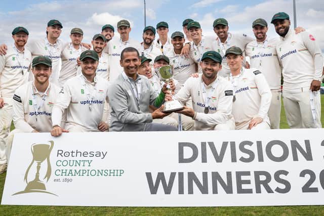 Louis Kimber (back row, second from left) celebrates Leicestershire winning the County Championship Division Two title at Northampton in September