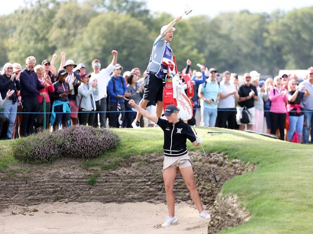 Charley Hull celebrates after chipping in from the bunker for eagle on the 11th hole in the final round of the AIG Women's Open. Pictures by Warren Little/Getty Images