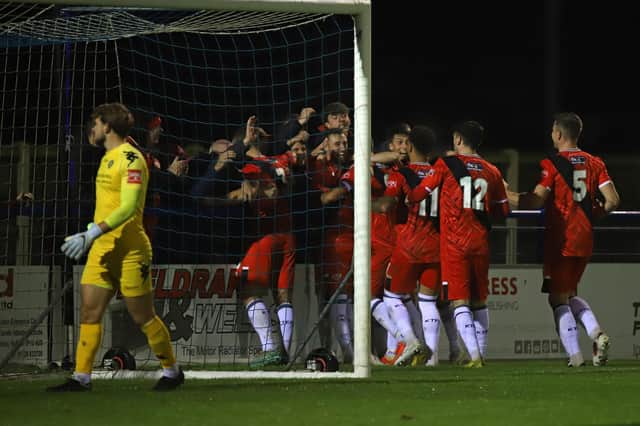 Kettering Town's players celebrate a goal in their 2-0 win at Leiston (Picture: Peter Short)