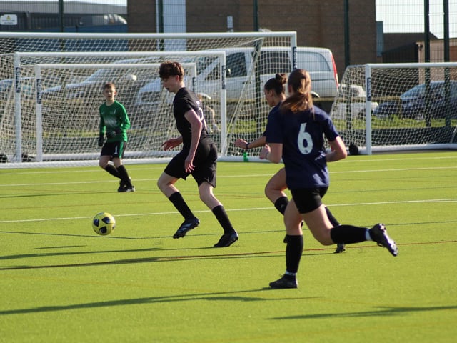 Action shot of the friendly football match between Years 10 and 11.