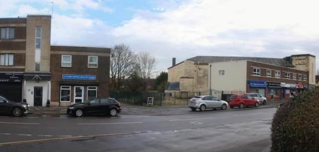 The gap between the buildings will be filled in with new shops