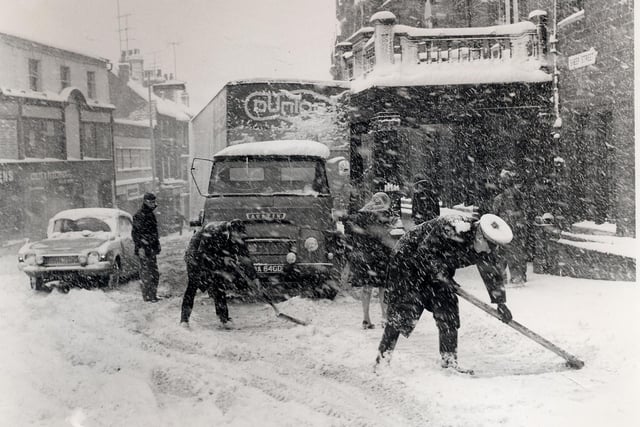 Clearing the snow in Sheep Street, Wellingborough. Undated