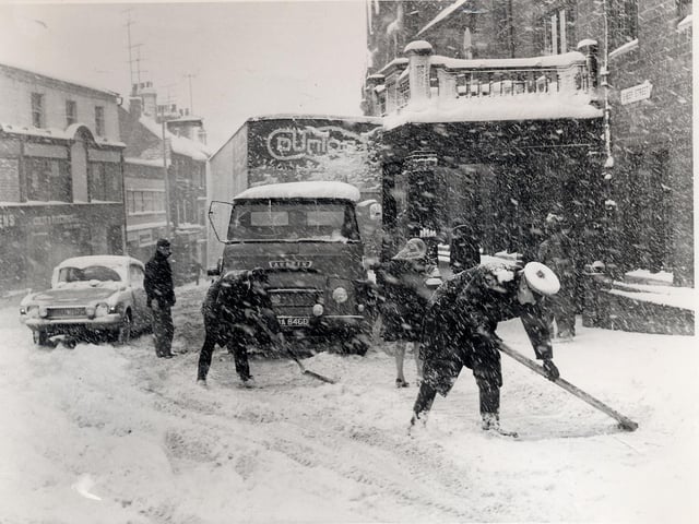 Clearing the snow in Sheep Street, Wellingborough. Undated