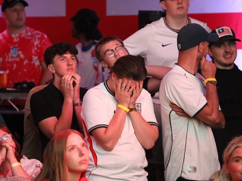 Fans at the Kettering Town FC World Cup Fan Zone watch England vs Argentina in the semi-final