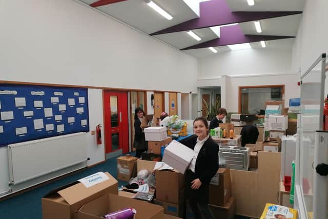 Year 5 students pack the goods.
