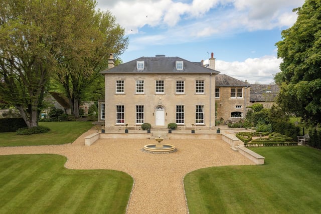 The house is set within beautiful landscaped gardens