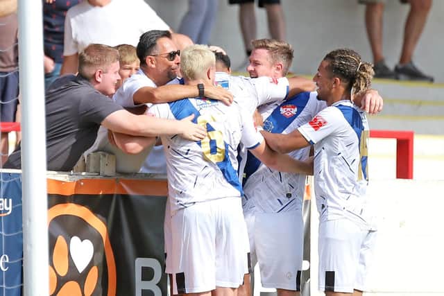 The Poppies players celebrate Tyrone Lewthwaite's opening goal at Bromsgrove (Picture: Peter Short)