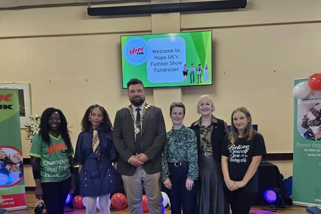 Hope UK fundraiser, Thuli Ndlovu pictured with Kettering mayor, Cllr Ben Jameson, and some of the models at its charity fashion show.