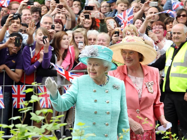 The Queen arrives outside the Corby International Swimming Pool and Corby Cube - June 2012