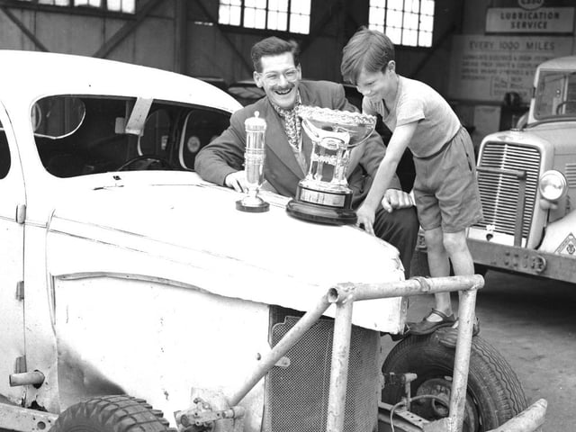 Aubrey Leyton and his prize-winning stockcar, possibly at Earls Barton, September 3, 1957