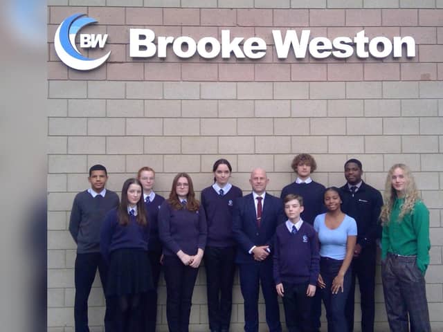 Principal Shaun Strydom and students from Brooke Weston Academy