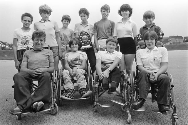 Parachamps from the 1980s Including David Holding - paralympic 100m gold medal winner in 1996 and four time London Marathon winner (front row second from right)