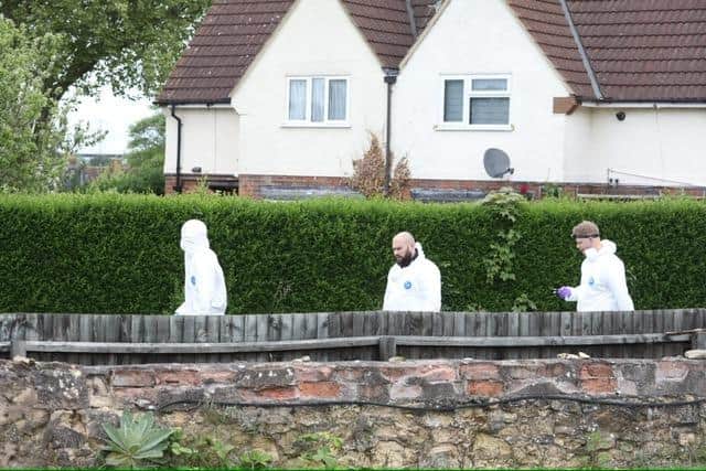 Officers involved in the search at Whitworth Aveune, Corby. Image: Alison Bagley