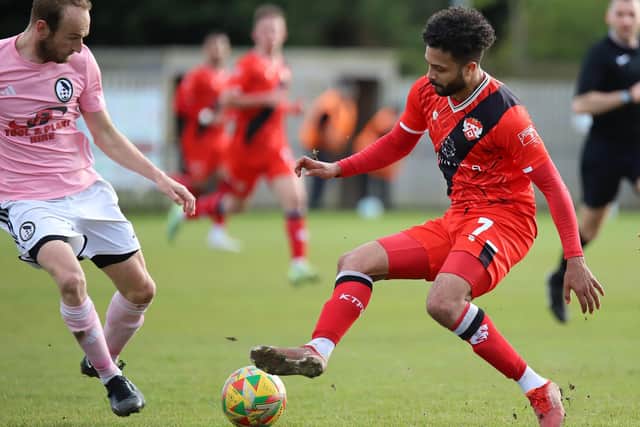 Bruno Andrade takes on his man in Kettering's 1-0 win over Coalville (Picture: Peter Short)