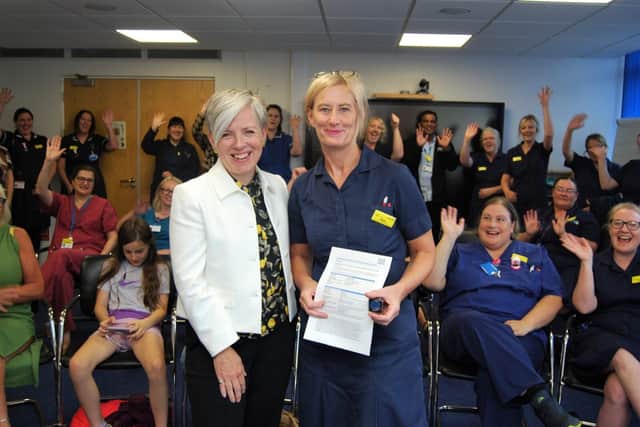 England's Chief Midwifery Officer, Kate Brintworth, presents the Silver Award to Mary Grey.