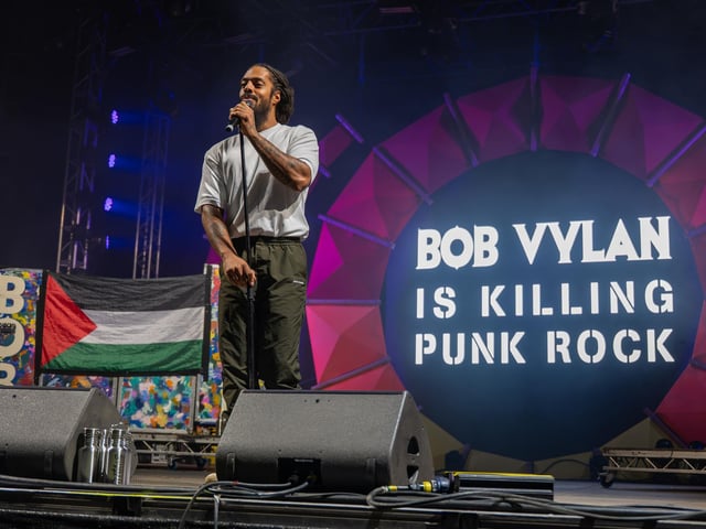 Bob Vylan talking to a packed Solasta Stage ahead of the band's stretching and yoga routine at the Shambala Festival on Friday, August 28, 2026. Photo by David Jackson.