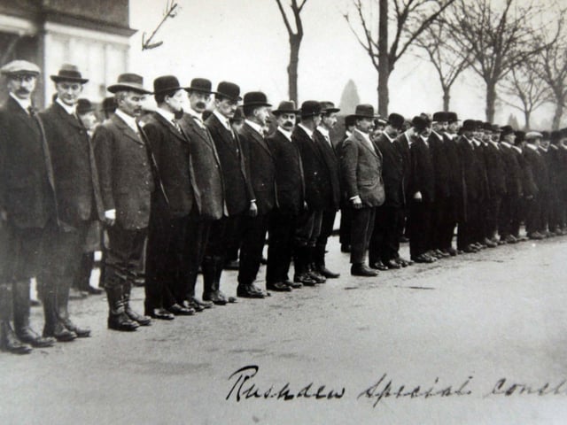 Rushden Special Constabulary outside 76-78 Hayway, Rushden, in 1916