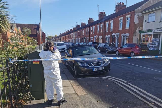 Forensics officers are on the scene of the shooting in Southampton Road, Northampton