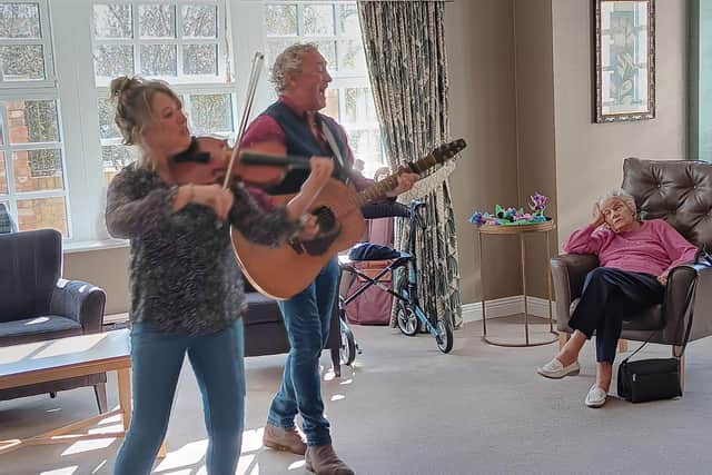 Residents joined in singing from the comfort of their armchairs with Rob and Sally