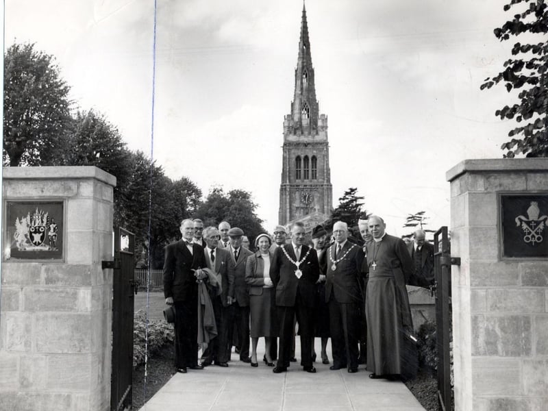 The Bishop of Peterborough with guests open the garden at Kettering Parish Church in 1960.