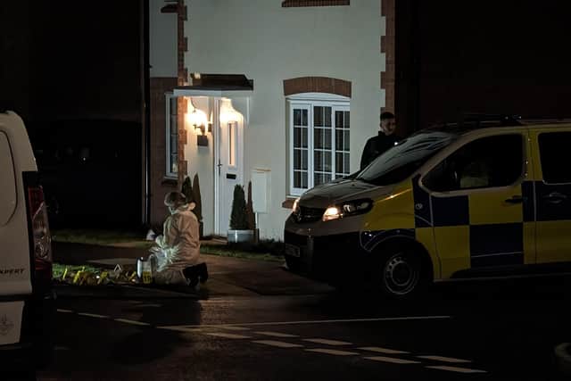 Forensics at the scene in the early hours of New Year's Day