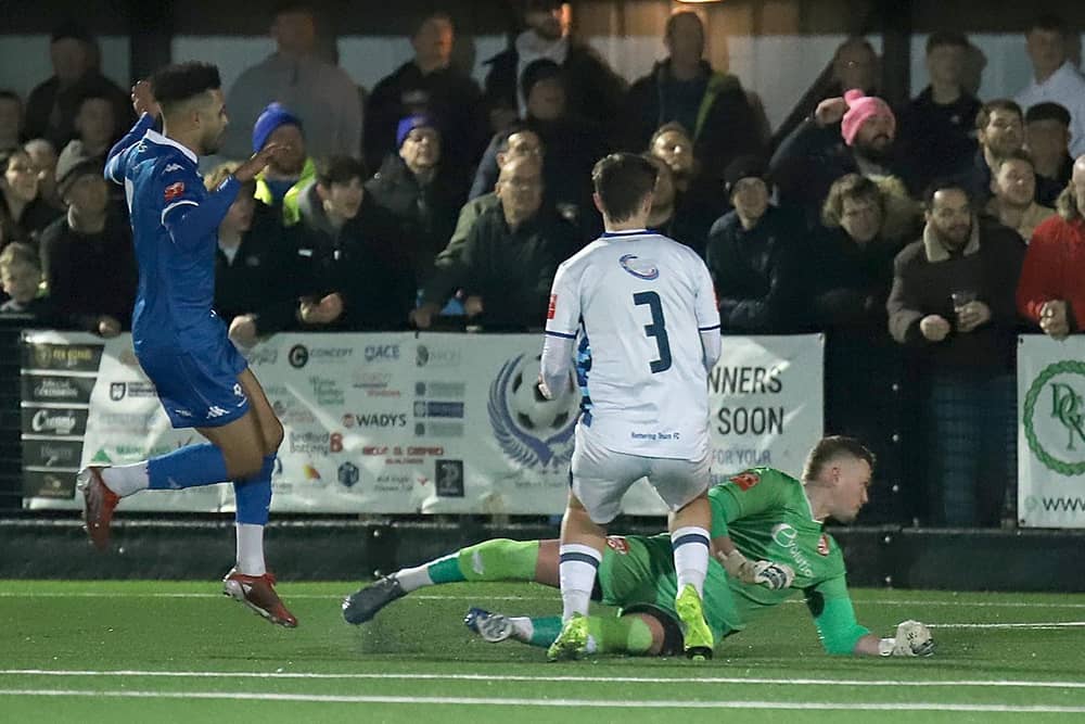 Bruno Andrade slots his second goal for Bedford Town against the Poppies (Picture: Peter Short)