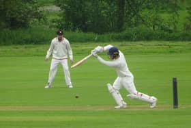 Joshua Knight hits out on his way to 48 for Geddington in their win over Brigstock. Picture by Nathan Armstrong