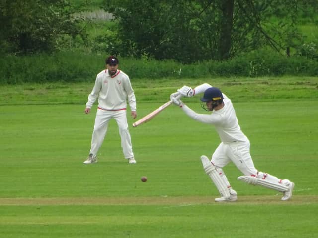 Joshua Knight hits out on his way to 48 for Geddington in their win over Brigstock. Picture by Nathan Armstrong